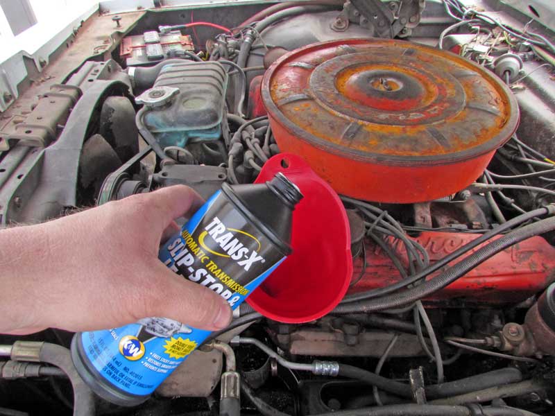 Pour the remaining slip stop into the reservoir, and then turn the steering wheel lock to lock 10-15 times to purge any air in the system.