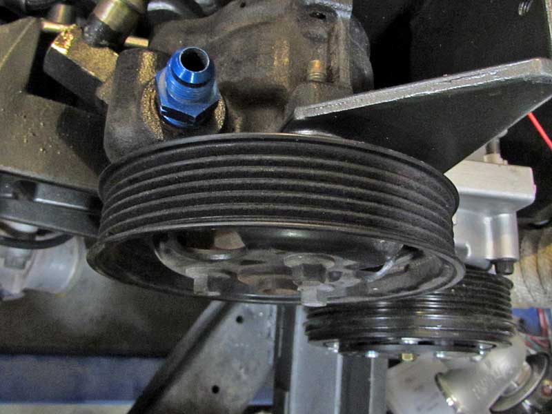 Serpentine belt pulleys are typically ribbed like this. This is a drive pulley for a power steering pump.