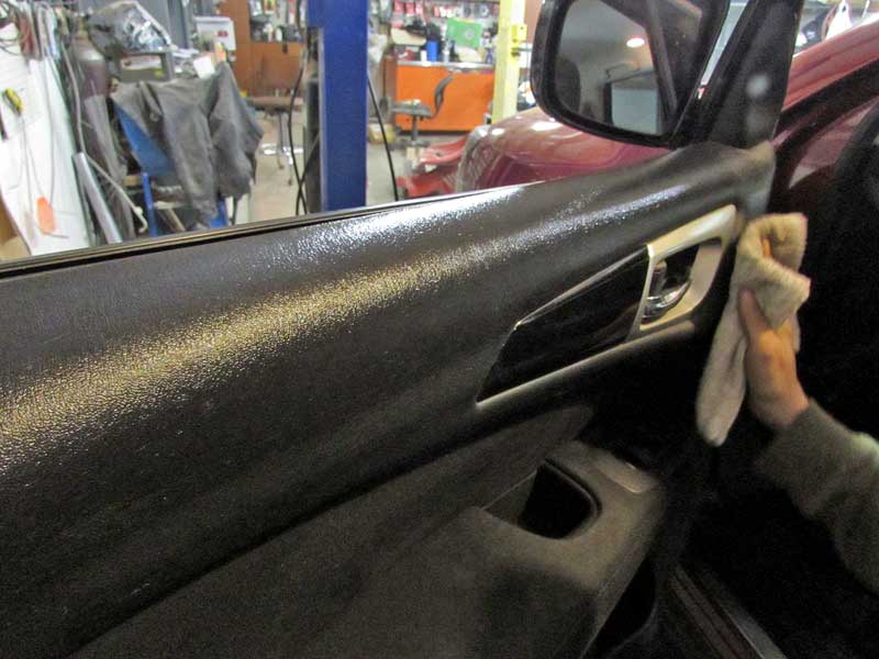 Do not allow the spray to dry on the panel.