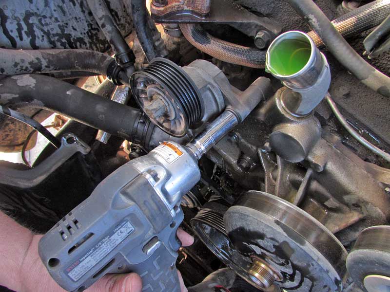 The serpentine belt comes off next, then it is on to removing all the bolts that hold the water pump in place. Here is where experience or a good shop manual pay off. Unfortunately water pump bolts are notorious for breaking, so care must be taken. This is one step that may be best left to the professionals, because if a bolt snaps in the block things get a lot more complicated.